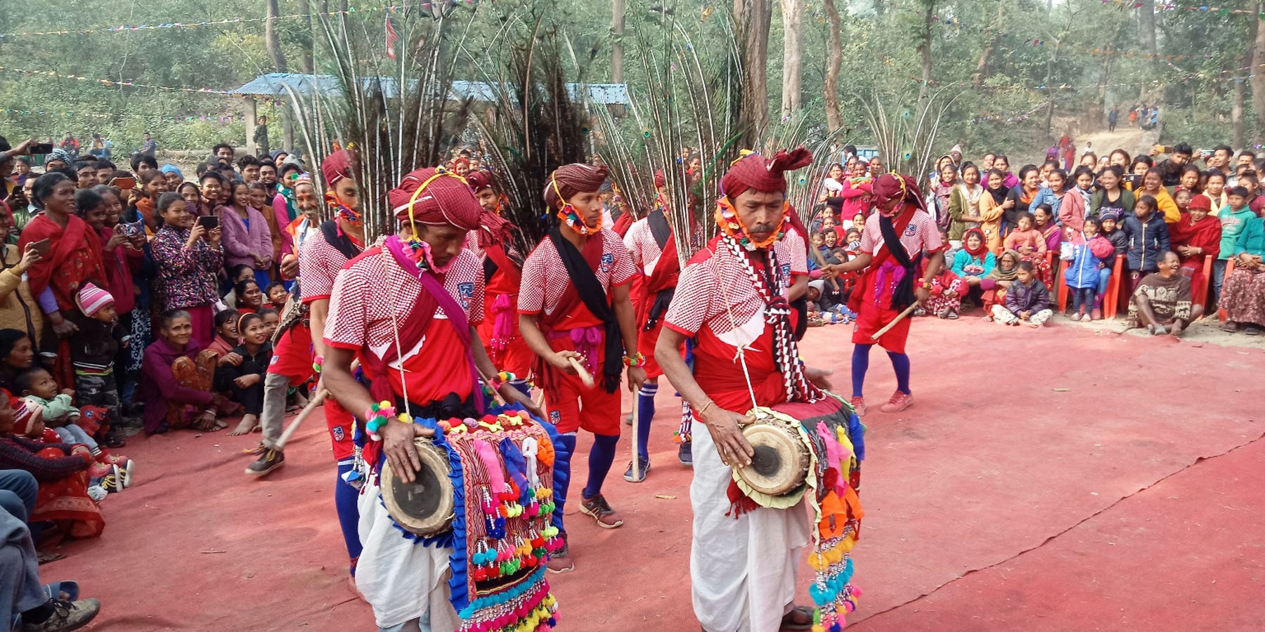 Tharu youths performing Lathwa dance