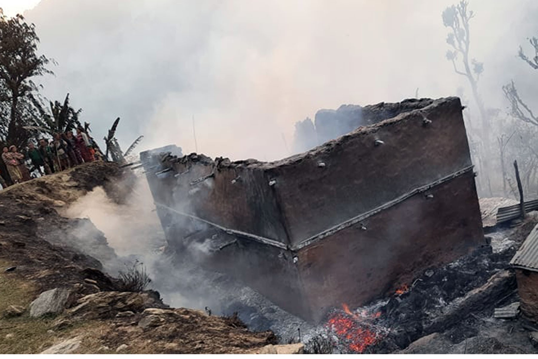 Four houses destroyed as bushfire spreads to human settlement