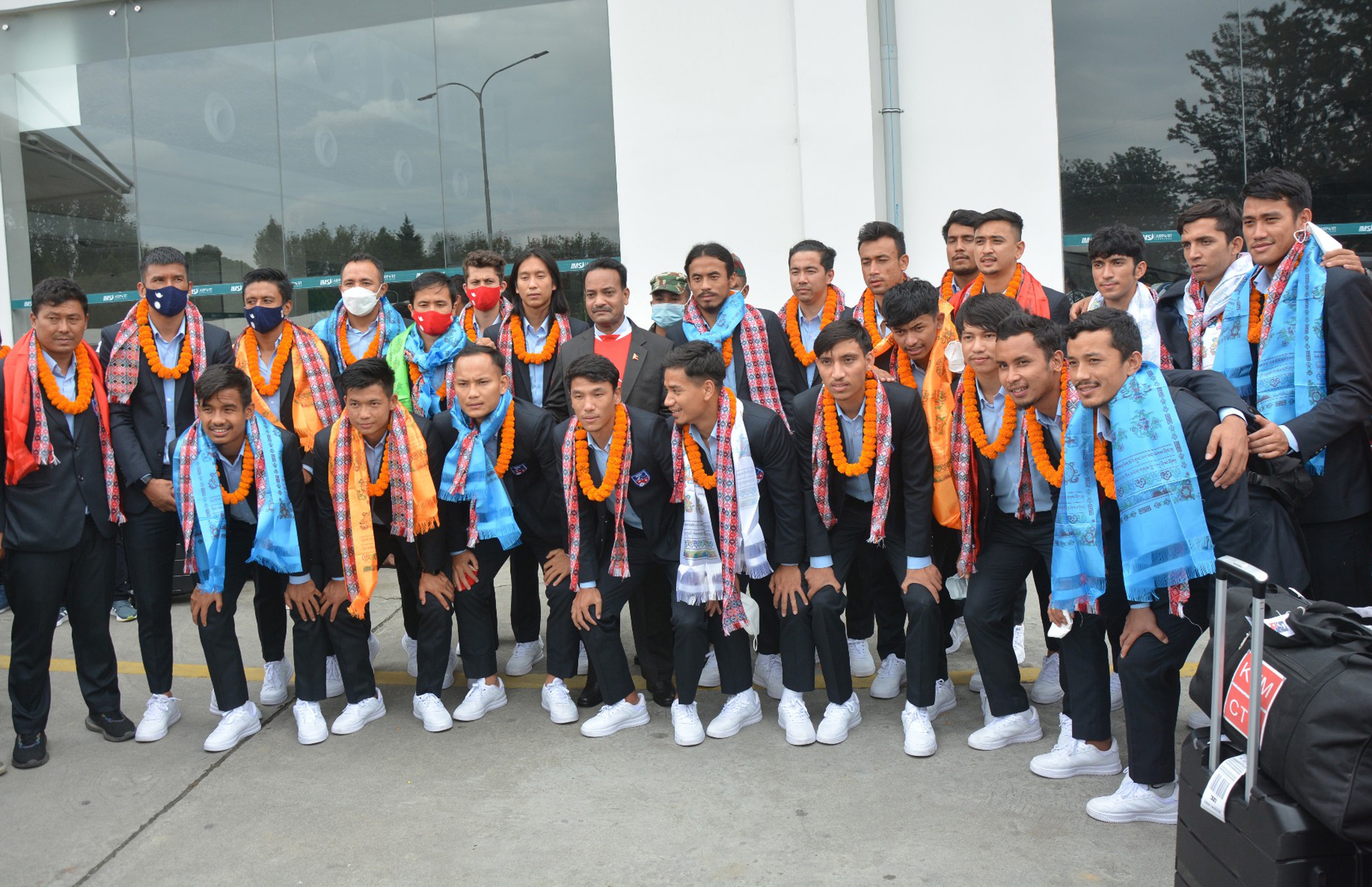 National football team returns home with first-runner up trophy